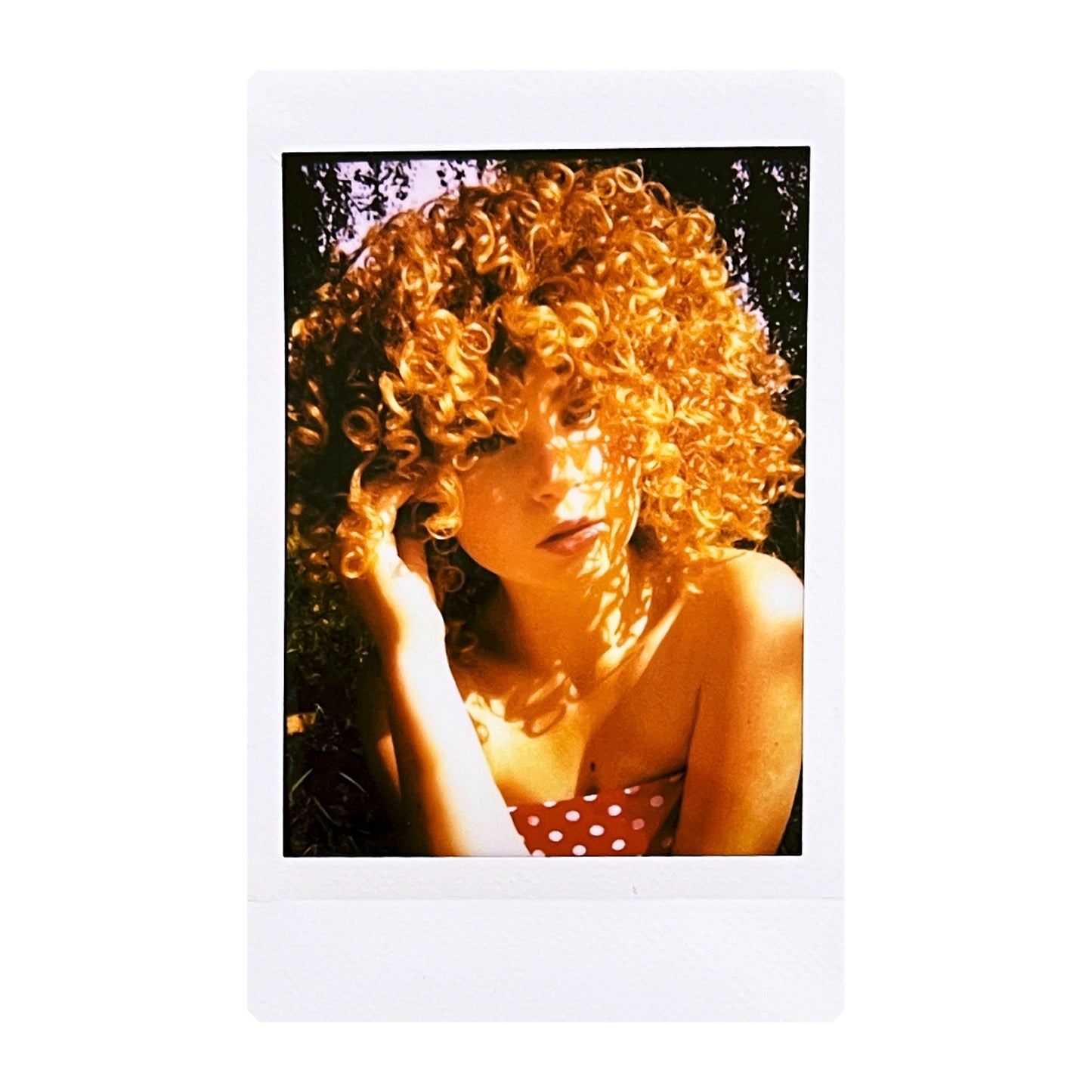 Double exposure instant photo of the girl with curls made with Jollylook EYE
