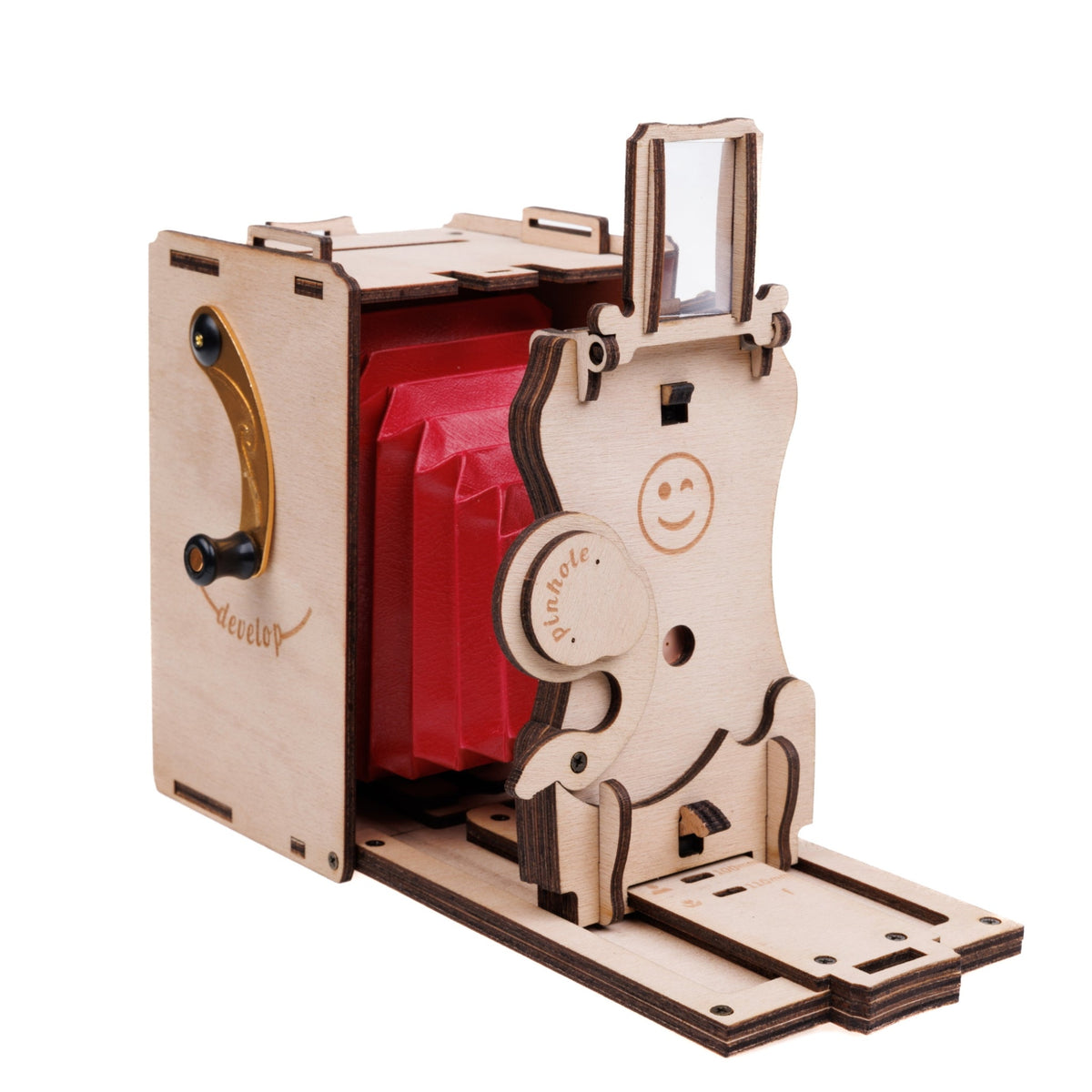 Unfolded natural wood Jollylook Pinhole Mini camera with shutter open