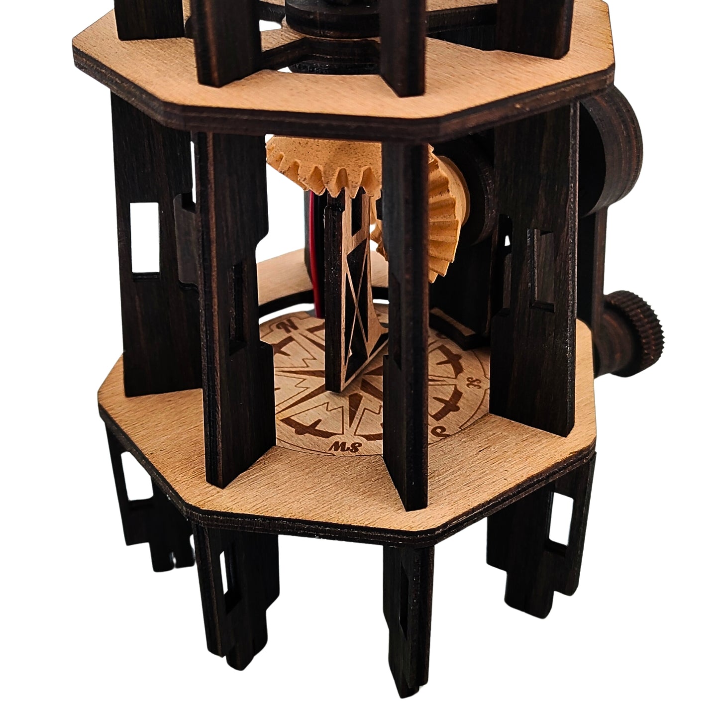 The Kinetic Lighthouse: A Mechanical Model with Real Light