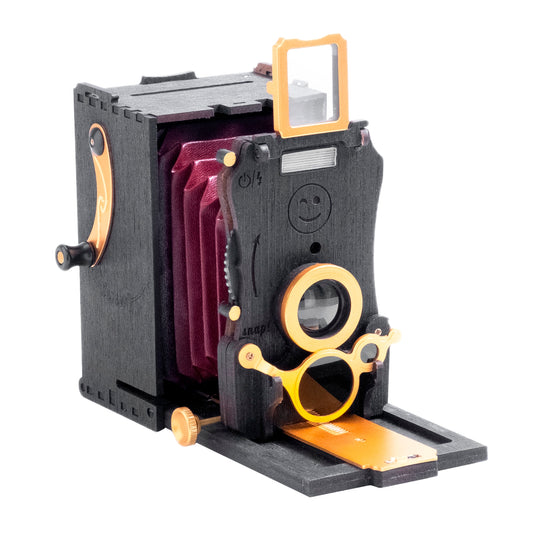 Jollylook Auto Mini Instant film camera - A modern, vintage-styled fold-out instant film camera, combining a classic design, in Ebony Black color