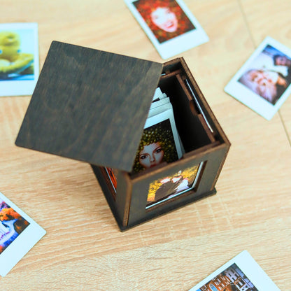 Jollylook Photo Box on a table with Instax Mini photos