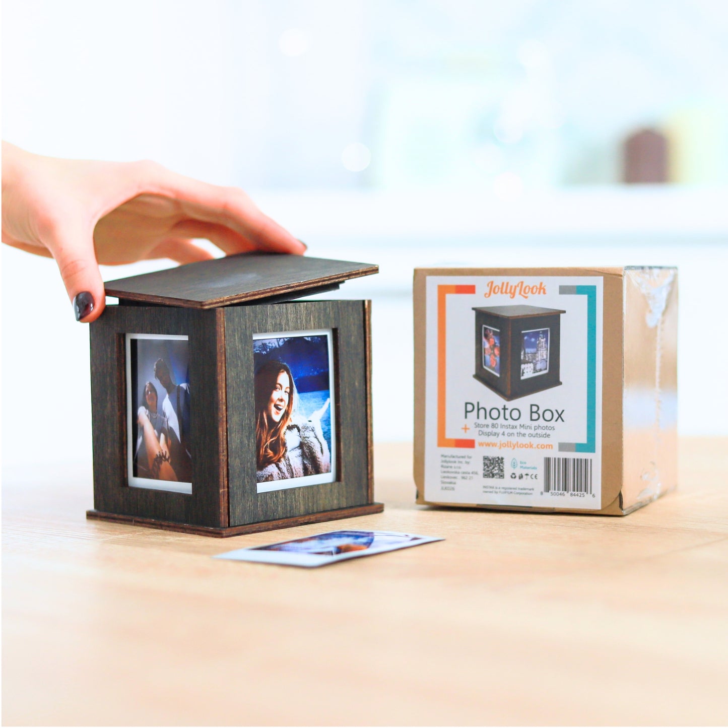 Jollylook Photo Box on a table with Instax Mini photos