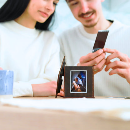 Jollylook Photo Box on a table with Instax Mini photos