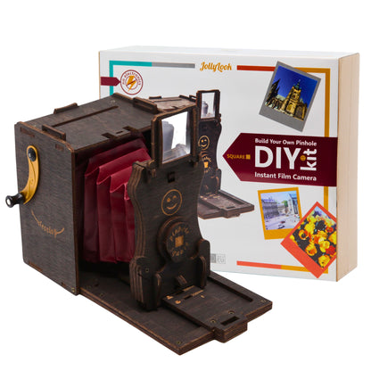 Image featuring the Pre-assembled Pinhole Instant SQUARE Film Camera in its Stained Brown color, positioned on a white background. Adjacent or nearby, the packaging is adorned with the Jollylook branding and product details.