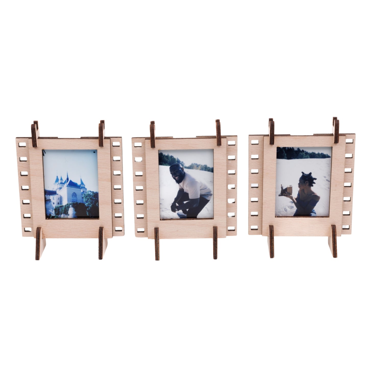 A set of three natural plywood interconnectable Instax mini film photo frames for instant mini photos.