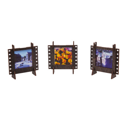 A set of three stained brown plywood interconnectable Instax SQUARE film photo frames for instant SQUARE photos.