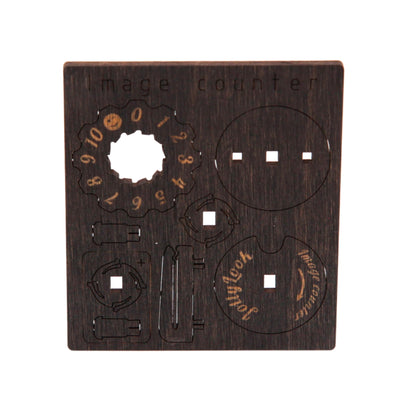 Unassembled wooden image counter in Stained Brown Color featuring the Jollylook logo for keeping track of how many images remain in your Instax film cartridge