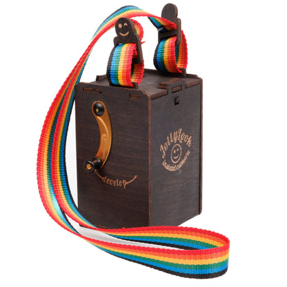 Rainbow fabric neckstrap designed for Jollylook cameras, featuring a sturdy natural wood lock for securely carrying the Jollylook  camera.